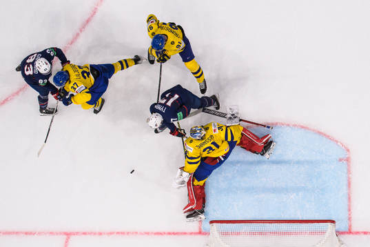 Conor Garland and T.J. Tynan of USA challenge Timothy