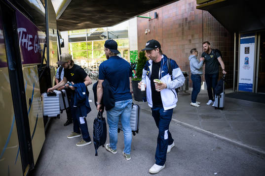 Rasmus Sandin of Sweden boards a bus when traveling from