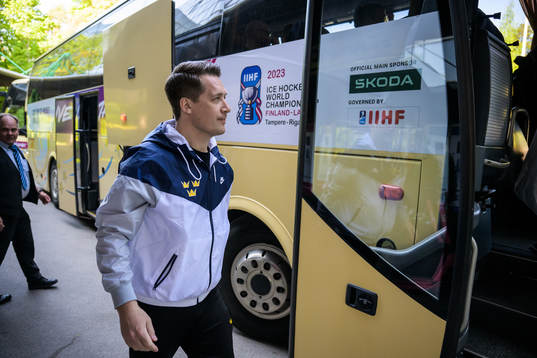 Head coach Sam Hallam of Sweden boards a bus when traveling