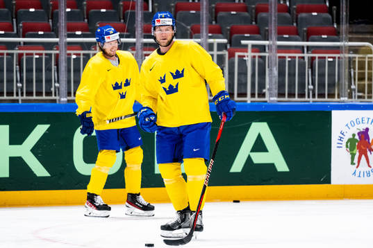 Rasmus Sandin and Christian Folin of Sweden at a practice