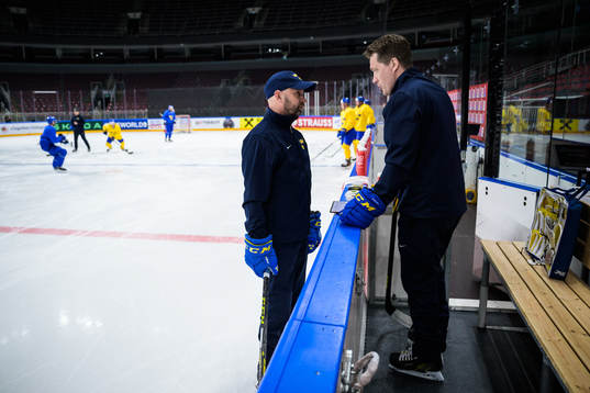 Goaltender coach Stefan Ladhe and head coach Sam Hallam of