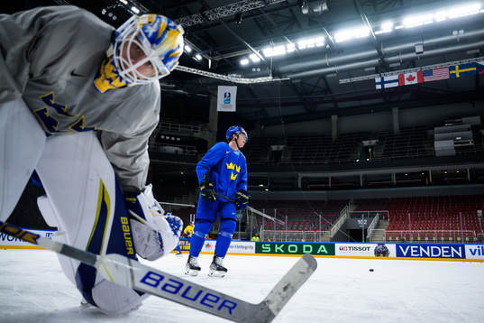 Goaltender Jesper Wallstedt and Lucas Raymond of Sweden at