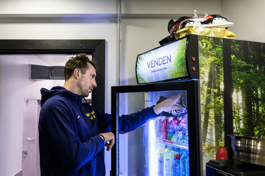 Patrik Nemeth of Sweden puts a skate inside a fridge