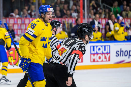 Jacob de la Rose of Sweden reacts towards referee Sean