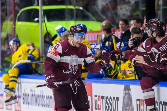 Miks Indrasis of Latvia celebrates scoring 1-2