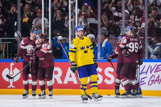Patrik Nemeth of Sweden looks dejected while Miks Indrasis