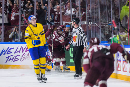 Leo Carlsson of Sweden looks dejected while Miks Indrasis