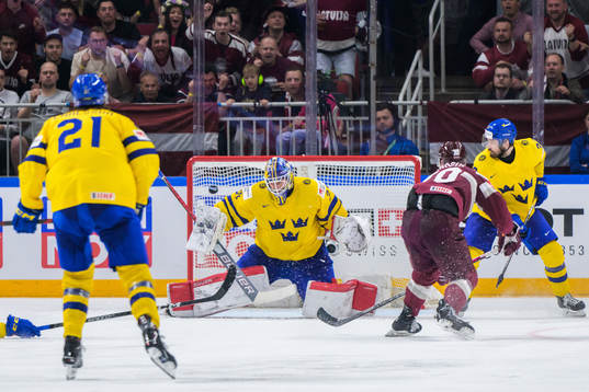 goaltender Lars Johansson of Sweden concedes 1-2 from Miks