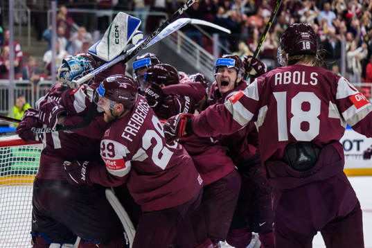 Players of Latvia celebrate