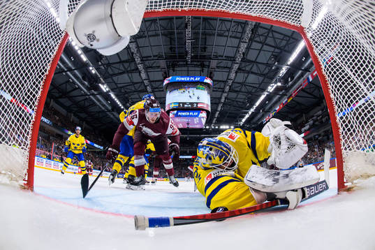 Oskars Batna of Latvia sees the 1-3 goal by Janis Jaks go