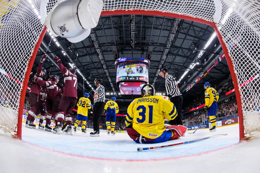 Players of Latvia celebrate the 1-3 goal by Janis Jaks