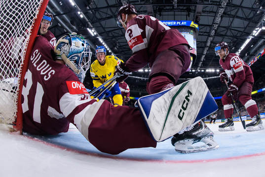 Fabian Zetterlund of Sweden challenges Kristaps Roberts
