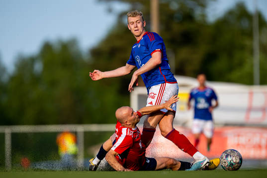 Albion Latifi of Råde and Henrik Bjørdal of Vålerenga