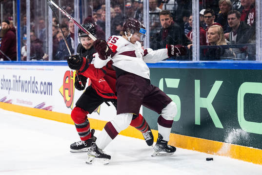 Scott Laughton of Canada and Dans Locmelis of Latvia