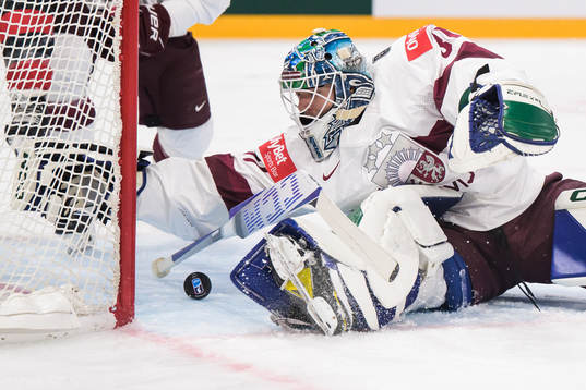 Goaltender Arturs Silovs of Latvia makes a save