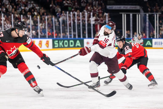Kaspars Daugavins of Latvia against Tyler Myers and Jack