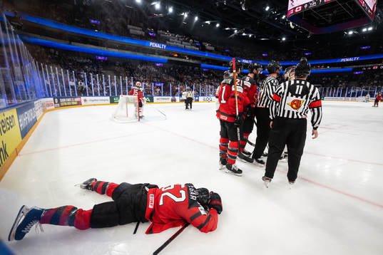 MacKenzie Weegar of Canada in pain