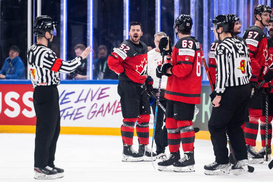 MacKenzie Weegar of Canada reacts