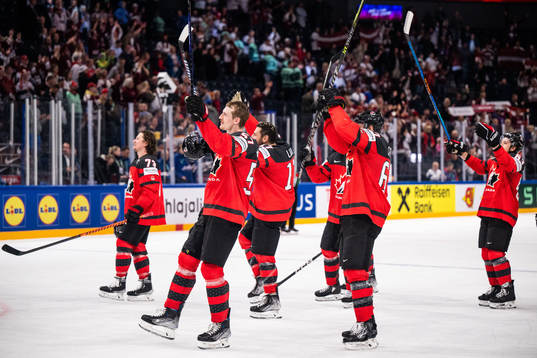 Players of Canada celebrate