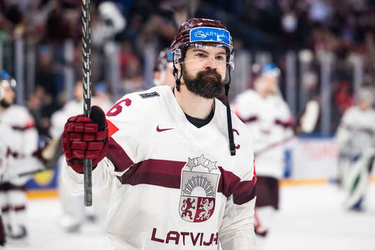 Kaspars Daugavins of Latvia looks dejected