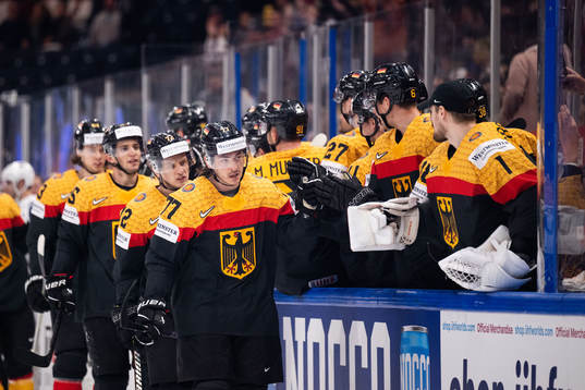 Daniel Fischbuch of Germany celebrates with team mates