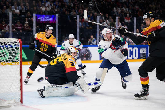 Goaltender Mathias Niederberger and Kai Wissmann of Germany