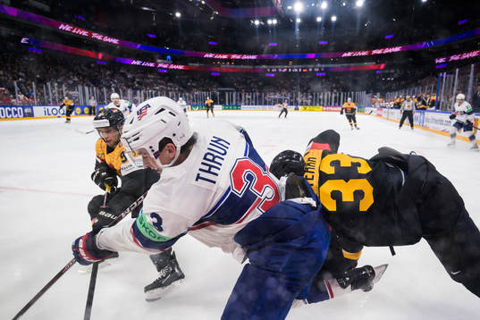 Frederik Tiffels and John Peterka of Germany in action