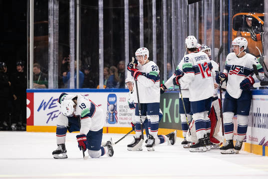 Cutter Gauthier and Lane Hutson of USA look dejected