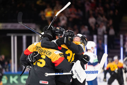 Goaltender Mathias Niederberger of Germany celebrate with