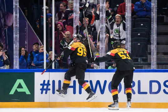 Frederik Tiffels and Moritz Seider of Germany celebrate the