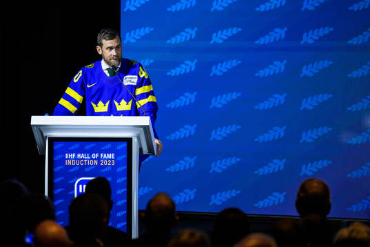 Former ice hockey player Henrik Zetterberg of Sweden holds
