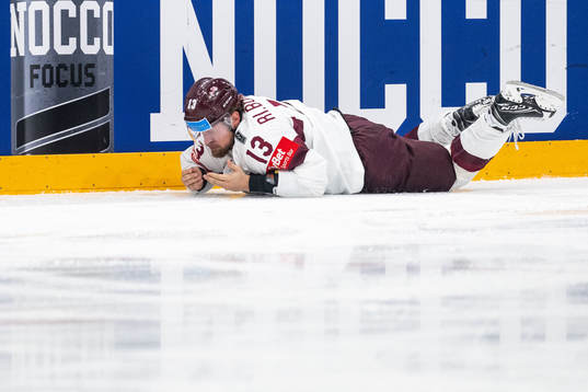 Rihards Bukarts of Latvia in pain