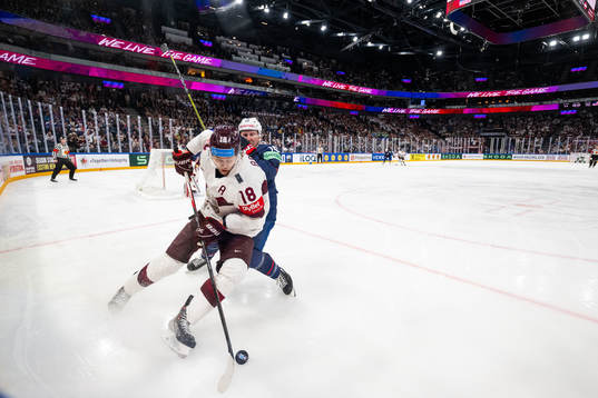 Rodrigo Abols of Latvia and Scott Perunovich of USA