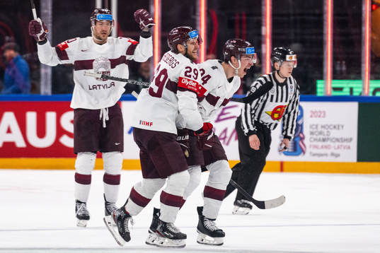Ralfs Freibergs and Kristians Rubins of Latvia celebrate