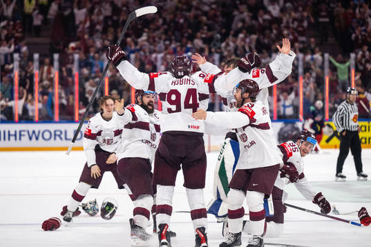 Players of Latvia celebrate
