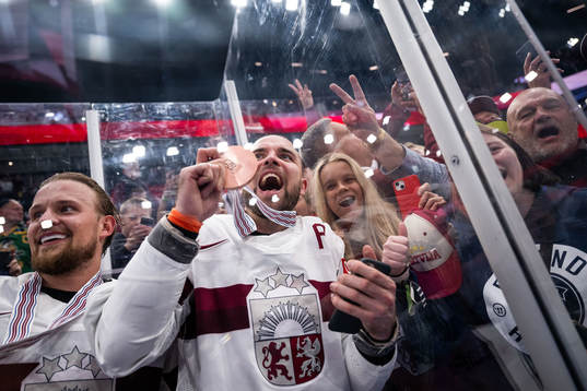 Rihards Bukarts and Roberts Bukarts of Latvia celebrate