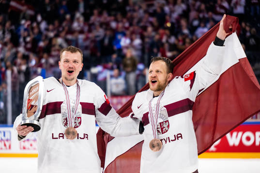 Oskars Cibulskis and Ralfs Freibergs of Latvia celebrate