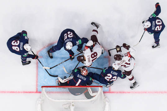 Patrick Brown, Nick Perbix, goaltender Casey Desmith,