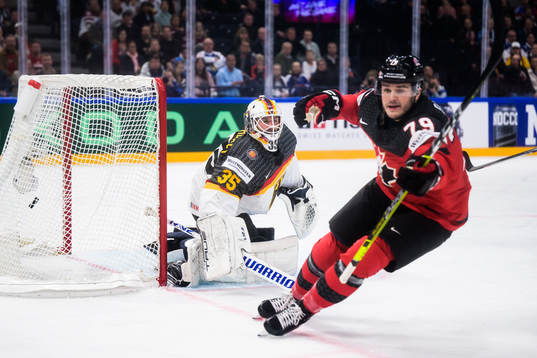 Goaltender Mathias Niederberger of Germany lets in the 1-1