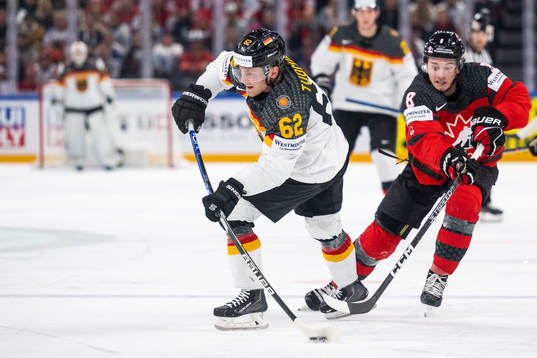 Parker Tuomie of Germany and Cody Glass of Canada