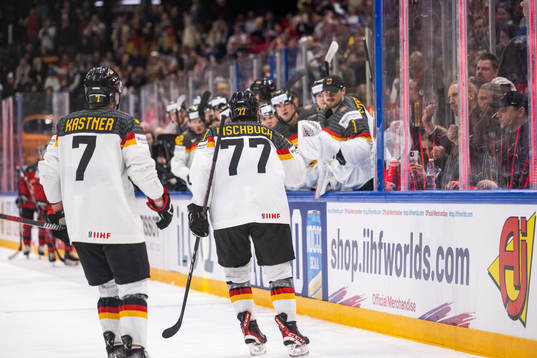Daniel Fischbuch of Germany celebrates with teammates