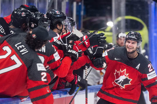 Scott Laughton of Canada celebrates scoring 5-2