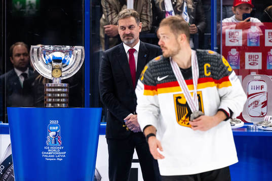 The World Champion trophy and Moritz Müller of Germany