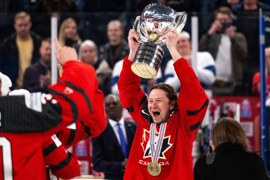 Tyler Toffoli of Canada celebrate with the trophy