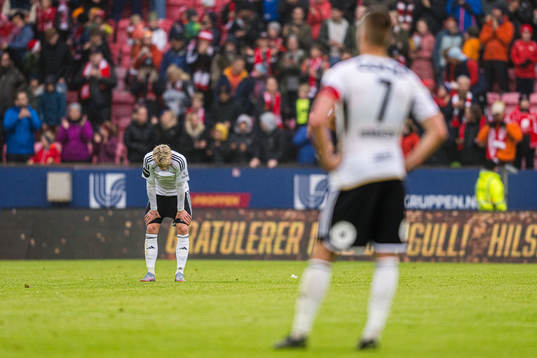 Kristall Mani Ingason of Rosenborg looks dejected