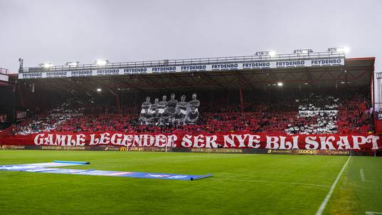 Spectators and TIFO in the stands at Brann Stadion