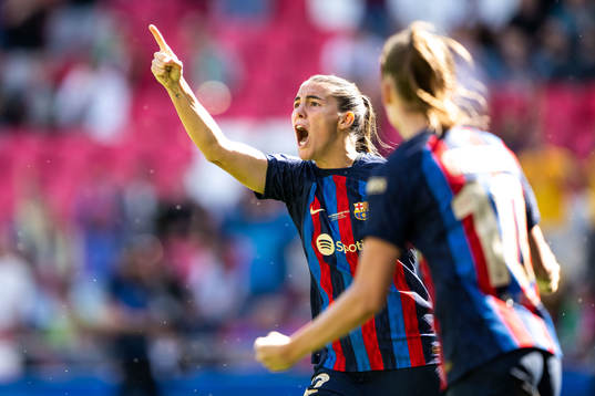 Patri Guijarro of Barcelona celebrates scoring 1-2