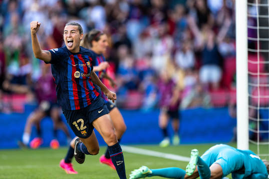 Patri Guijarro of Barcelona celebrates scoring 2-2