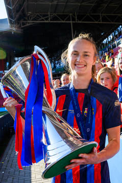 Caroline Graham Hansen of Barcelona with the Champions