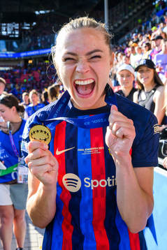 Fridolina Rolfö of Barcelona celebrates with her gold medal